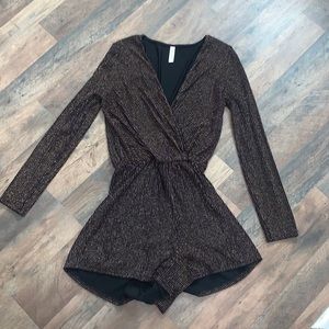 Brand: Peppermint. Romper. Black, Gold, Purple. Long Sleeve.